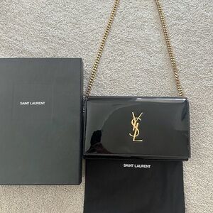 Saint Laurent Glossy Black Clutch with Gold Chain